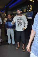 John Abraham arrived at airport in Mumbai on 3rd Jan 2014